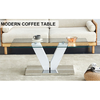 Modern Minimalist Coffee Table. Transparent Tempered Glass Tabletop With Silver MDF Pillars. Suitable For Living Room And Dining Room