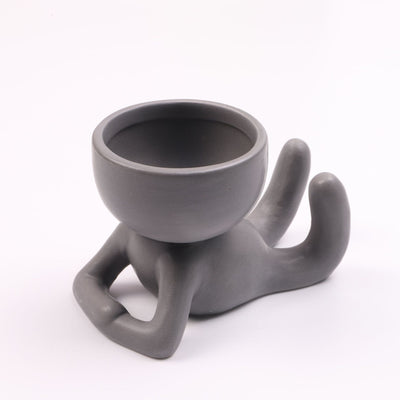 Humanoid ceramic flower pot