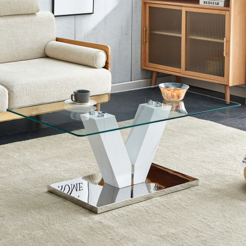 Modern Minimalist Coffee Table. Transparent Tempered Glass Tabletop With Silver MDF Pillars. Suitable For Living Room And Dining Room